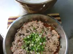 梅菜鱿鱼蒸肉饼